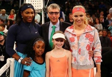 Richwoods High School No. 1 singles player Julia Wojtowicz, at age 10, with world-ranked tennis stars Caroline Wozniacki and Serena Williams at Madison Square Garden in March of 2016.