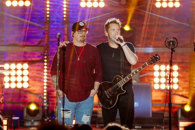 <p>Catherine Powell/Getty Images for CMT</p> HARDY and Chad Kroeger of Nickelback on 'CMT Crossroads: Nickelback & HARDY'