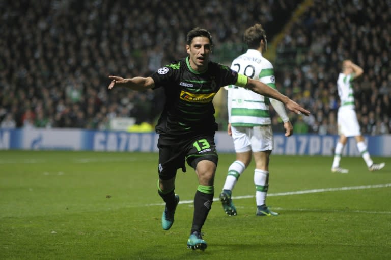 Monchengladbach's midfielder Lars Stindl celebrates scoring his team's first goal during the UEFA Champions League Group C football match between Celtic and Borussia Monchengladbach at Celtic Park stadium in Glasgow, Scotland on October 19, 2016