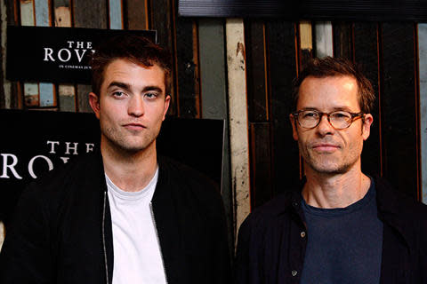 robert pattinson (l) and guy pearce at the sydney press conference for 'the rover' on june 6.