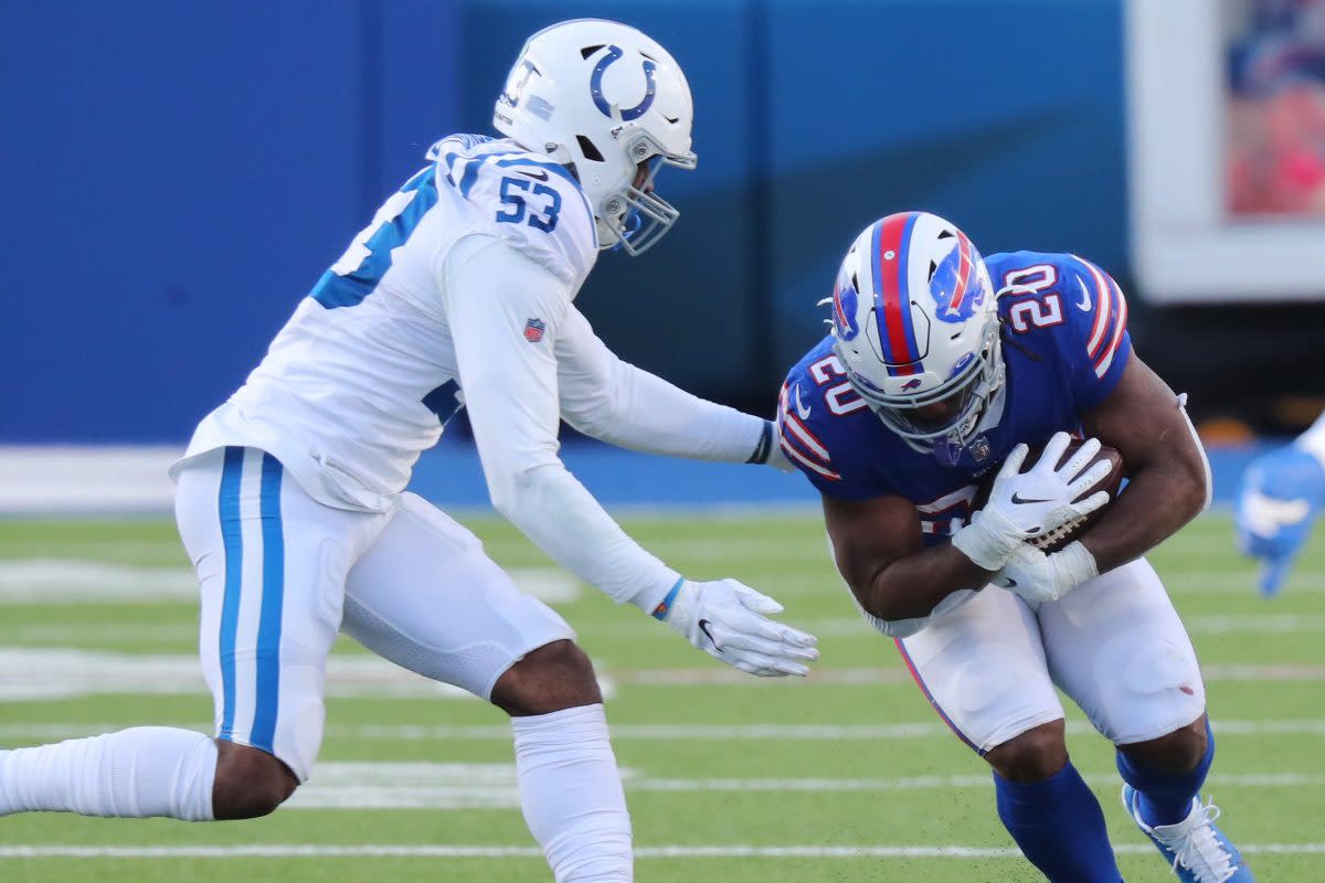 Zack Moss of the Bills is tackled by Darius Leonard of the Colts