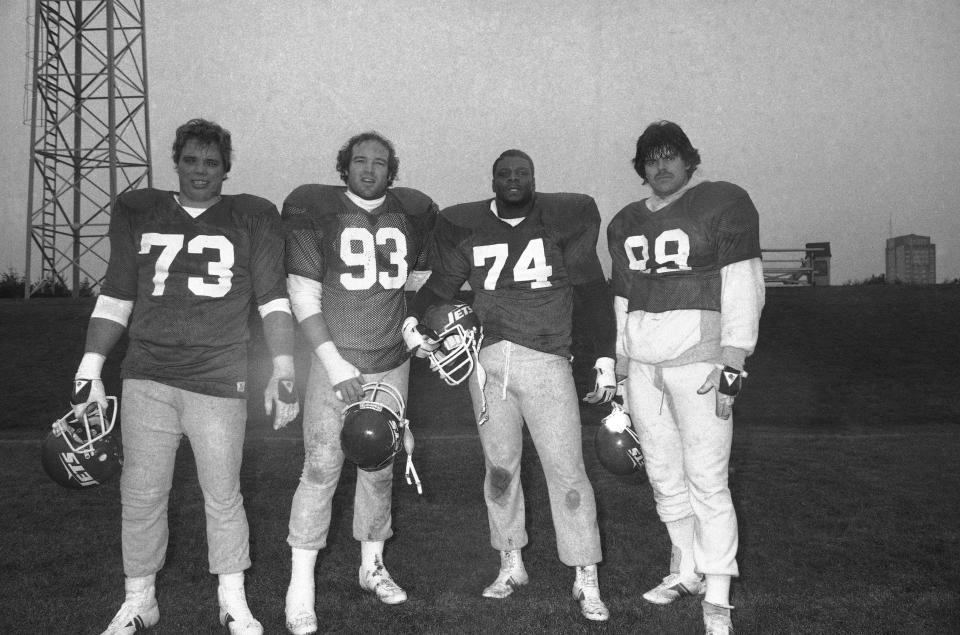 The Jets' "New York Sack Exchange" — from left, defensive end Joe Klecko, defensive tackles Marty Lyons and Abdul Salaam, and defensive end Mark Gastineau — pose for a photo, Wednesday, Jan. 6, 1982, at the team's training facility at Hofstra University in Hempstead, L.I.