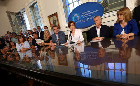 Former Argentine President and Senator Cristina Fernandez de Kirchner speaks alongside members of the Congress during a news conference in Buenos Aires, Argentina December 7, 2017. REUTERS/Marcos Brindicci