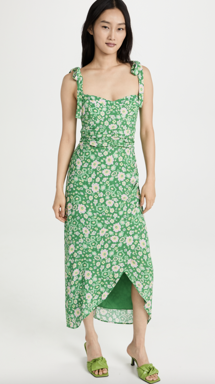 asian model in green sandals and green floral WAYF Malibu Faux Wrap Midi Dress (Photo via Shopbop)