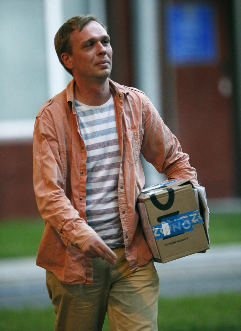 Prominent Russian investigative journalist Ivan Golunov, leaves a Investigative Committee building in Moscow, Russia, Tuesday, June 11, 2019. In a surprising turnaround, Russia's police chief on Tuesday dropped all charges against a prominent investigative reporter whose detention sparked public outrage and promised to go after the police officers who tried to frame the journalist as a drug-dealer. (AP Photo/Alexander Zemlianichenko)