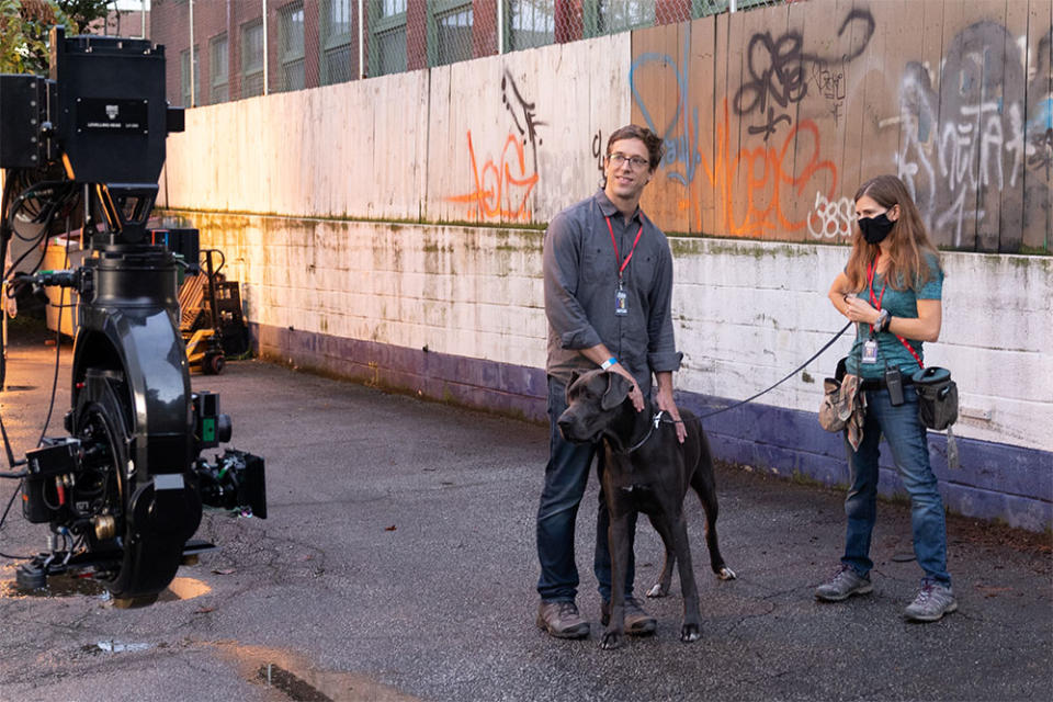 Director Josh Greenbaum with Hunter on the set of Strays.