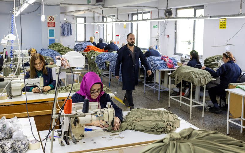 Employees work at a textile factory in Istanbul