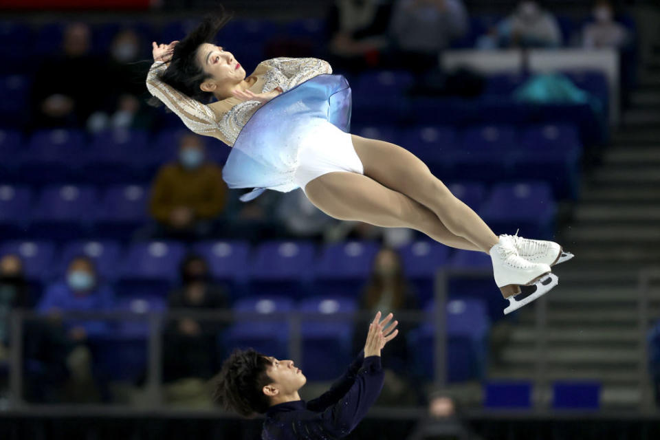 Sui Wenjing and Han Cong of China skate in the Pairs Free Skate during the ISU Grand Prix of Figure Skating-Skate Canada at Doug Mitchell Thunderbird Sports Centre on Oct. 30, 2021 in Vancouver, British Columbia.<span class="copyright">Matthew Stockman—International Skating Union via Getty Images</span>