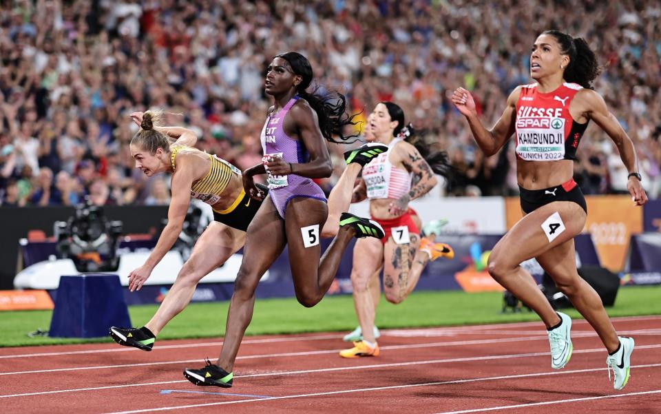 Neita (C) overcame issues with cramp on the blocks to claim bronze just 1/100th of a second outside Luckemkemper's winning time - GETTY IMAGES