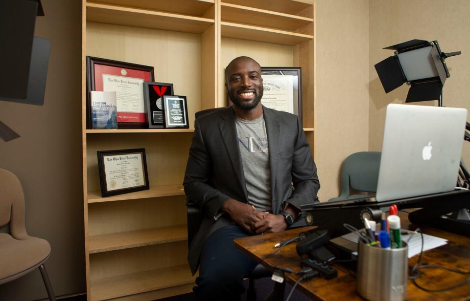 Kwame Christian, an attorney and founder of the American Negotiation Institute, in the Columbus office where he records his popular podcasts.