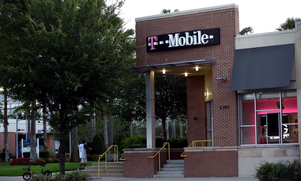 <span>A T-Mobile store in Orlando, Florida.</span><span>Photograph: Paul Hennessy/Sopa Images/Rex/Shutterstock</span>