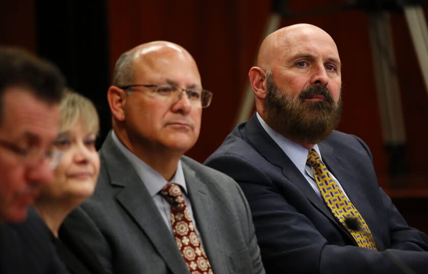 Al Seib  Los Angeles Times DAVID WRIGHT, right, is no longer general manager of the Department of Water and Power. Marty Adams, center, will serve as interim general manager.