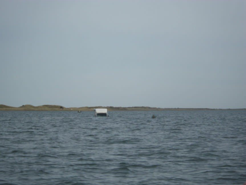 The campervan became stranded in high tide on Saturday (Seahouses RNLI)