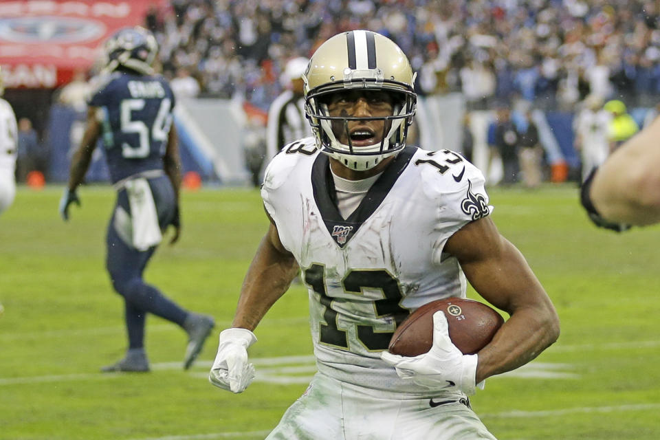 New Orleans Saints wide receiver Michael Thomas (13) scores a touchdown on a 2-yard pass reception against the Tennessee Titans in the second half of an NFL football game Sunday, Dec. 22, 2019, in Nashville, Tenn. The Saints won 38-28. (AP Photo/James Kenney)