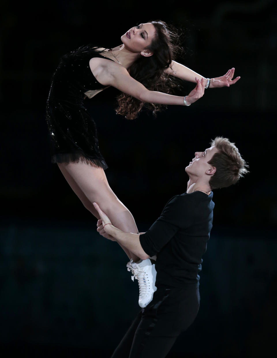 Elena Ilinykh and Nikita Katsalapov of Russia perform during the figure skating exhibition gala at the Iceberg Skating Palace during the 2014 Winter Olympics, Saturday, Feb. 22, 2014, in Sochi, Russia. (AP Photo/Ivan Sekretarev)