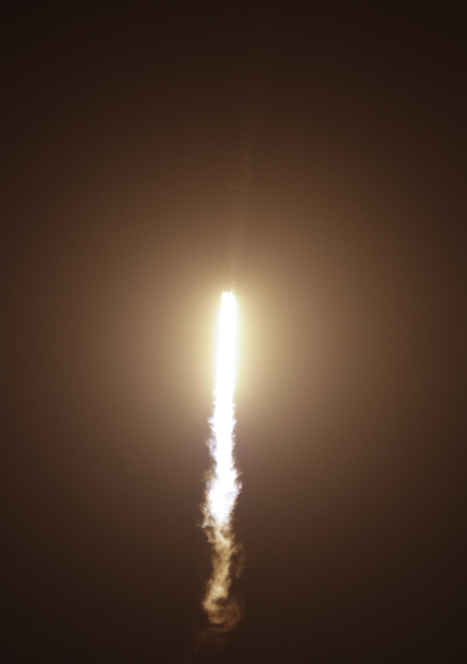 A SpaceX Falcon heavy rocket lifts off from pad 39A at the Kennedy Space Center in Cape Canaveral, Fla., early Tuesday, June 25, 2019. The Falcon rocket has a payload military and scientific research satellites. (AP Photo/John Raoux)