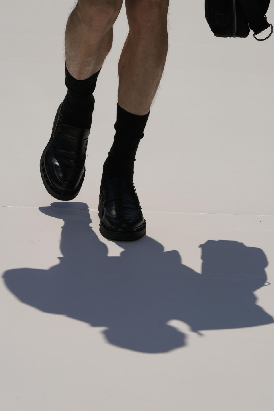 A model wears a creation as part of the Valentino men's Spring Summer 2024 collection presented in Milan, Italy, Friday, June 16, 2023. (AP Photo/Luca Bruno)