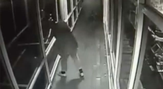 The man can be seen in the video headbutting the glass. Source: Rockingham Maternity and Family Practice