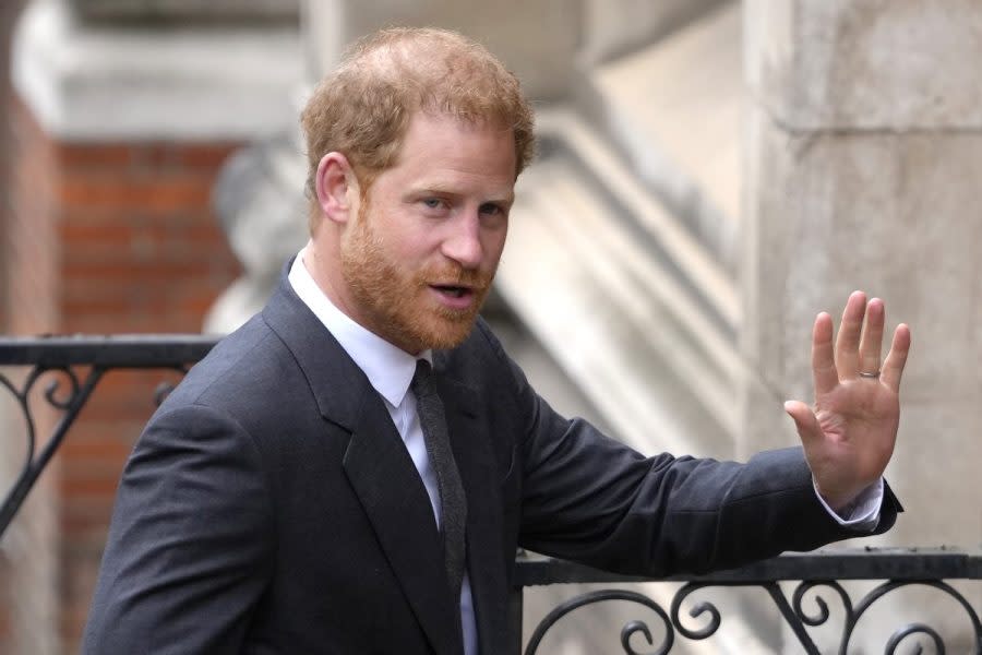 Britain's Prince Harry salutes media as he arrives at the Royal Courts of Justice in London, on March 30, 2023. (AP Photo/Kirsty Wigglesworth, File)