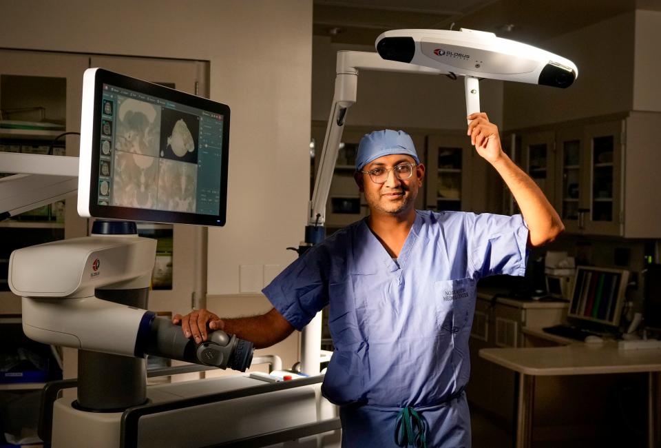 Neurosurgeon Dr. Dhruve Jeevan showcases the  ExcelsiusGPS robotic navigation platform, which helps map the brain, at St. David’s North Austin Medical Center in October. St. David's is an innovator in robotics.