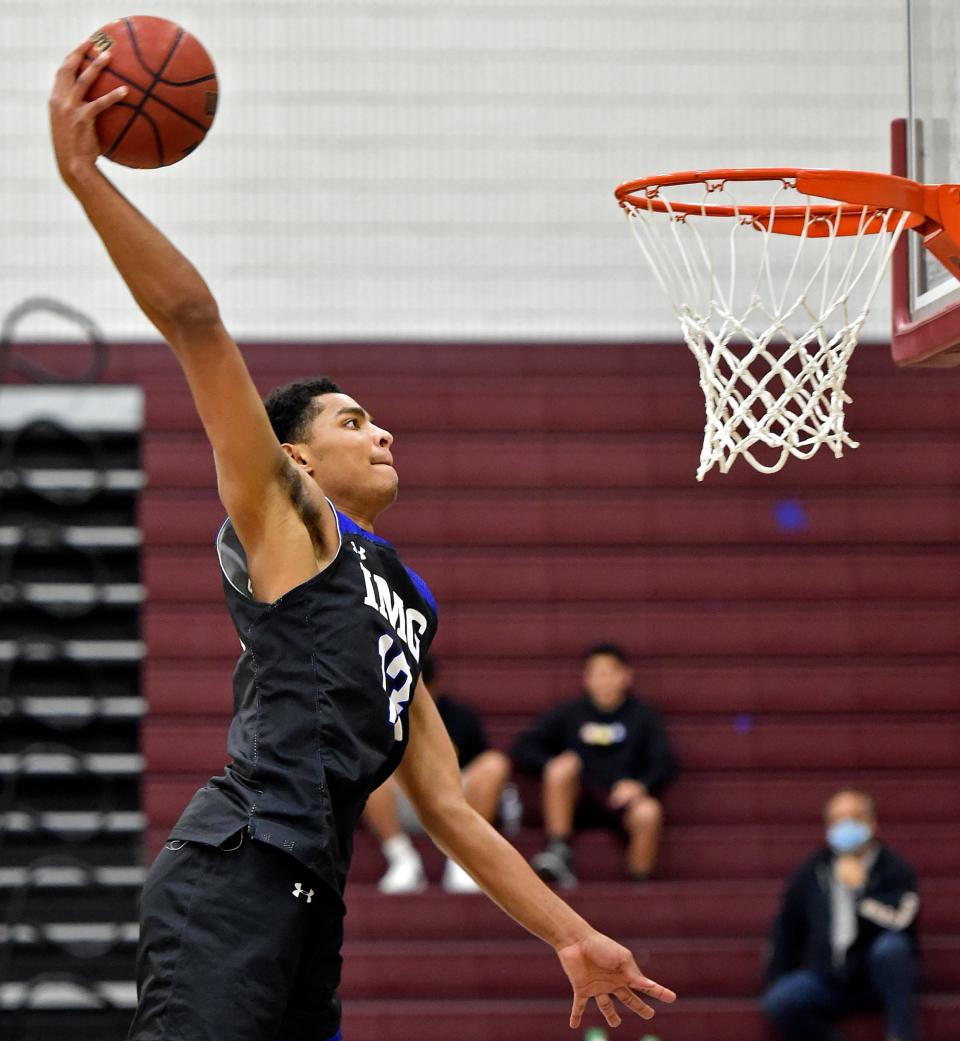 IMG Academy Ascenders' Jett Howard (13) slam dunks for two points against the Riverview Rams during a home non-conference game at Riverview High School on Wednesday evening, Jan. 6, 2021. THOMAS BENDER/HERALD-TRIBUNE