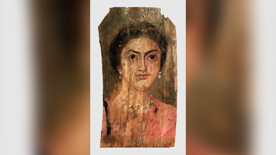 This portrait, painted on wood sometime between A.D. 175 and 200, shows a dark-haired woman wearing a matching necklace and earrings.