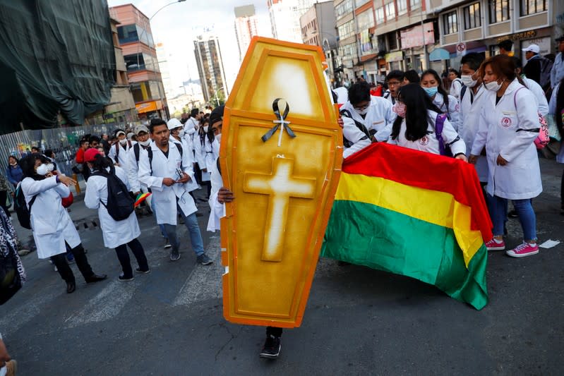 Medical students demonstrate to pay tribute to those killed during the protests, in La Paz