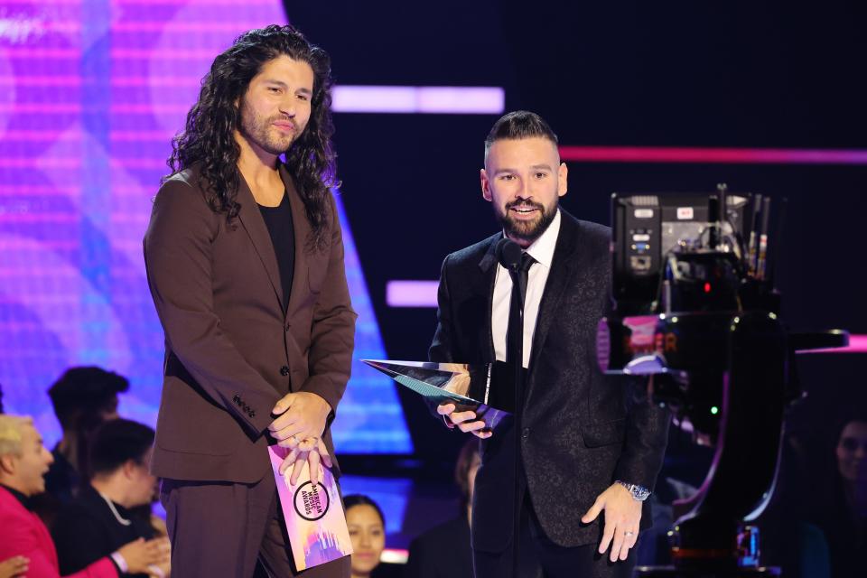 Dan Smyers (left) and Shay Mooney of Dan + Shay accept the favorite country duo or group award.