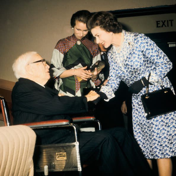 <p>Along with Princess Anne, the Queen presents an award to silent film star Charlie Chaplin in London in 1976.</p>