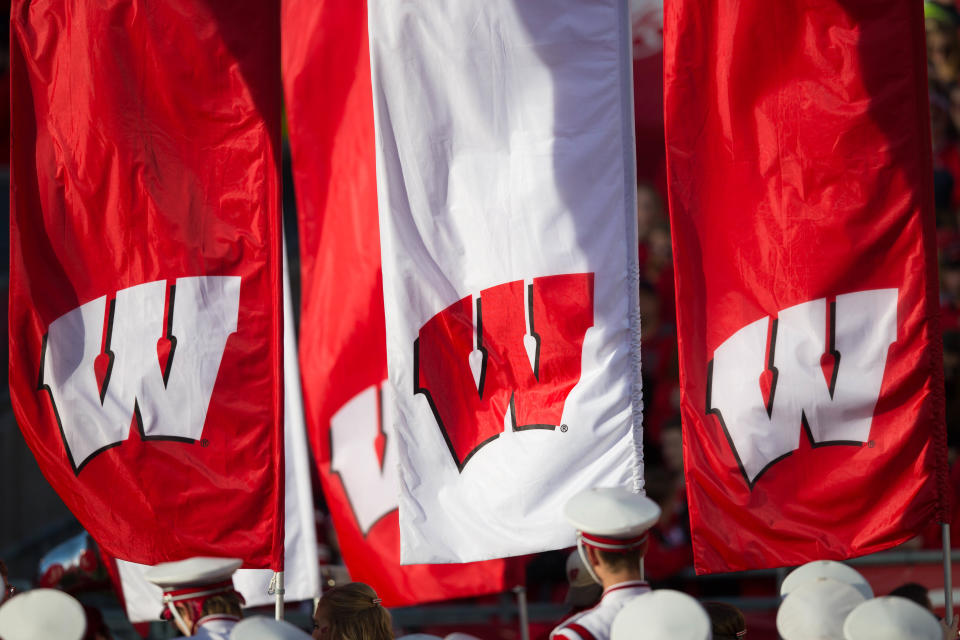 Nov 12, 2016; Madison, WI, USA; Wisconsin logos on flags during player announcements prior to the game against the Illinois Fighting Illini at Camp Randall Stadium. Wisconsin won 48-3. Mandatory Credit: Jeff Hanisch-USA TODAY Sports