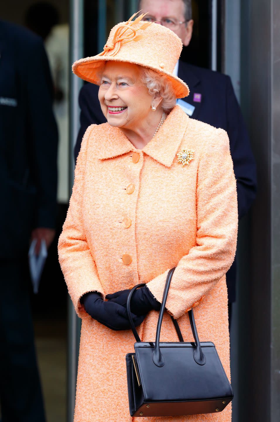 Her purse is used to signal her staff