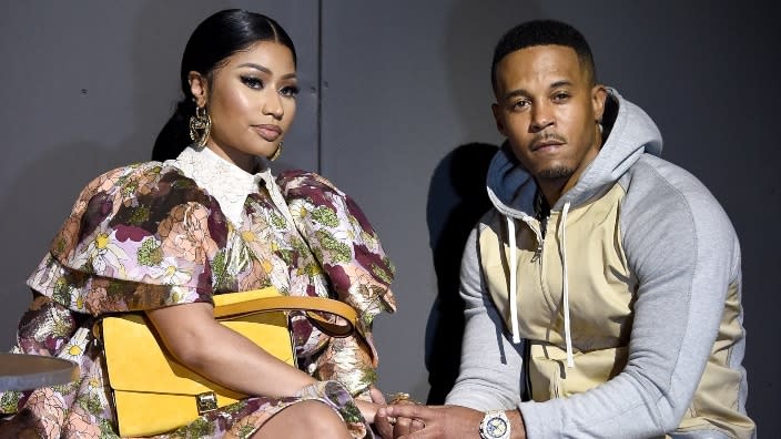 Rap star Nicki Minaj (left) and husband Kenneth Petty (right) attend the Marc Jacobs runway show in Feb. 2020 in New York City. (Photo by Dimitrios Kambouris/Getty Images)
