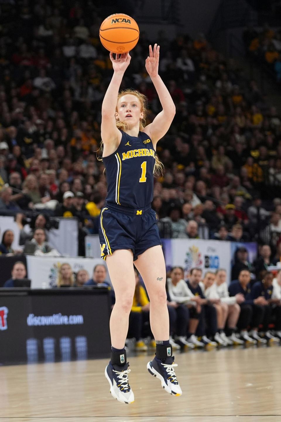 Michigan guard Lauren Hansen (1) shoots during the first half against Iowa in the semifinals of the Big Ten women's tournament at Target Center in Minneapolis on Saturday, March 9, 2024.