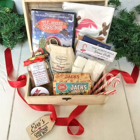 Personalised wooden night before Christmas Eve Pre Filled box, pillow case, DVD, Hot chocolate, sweets - Credit: Not On The High Street