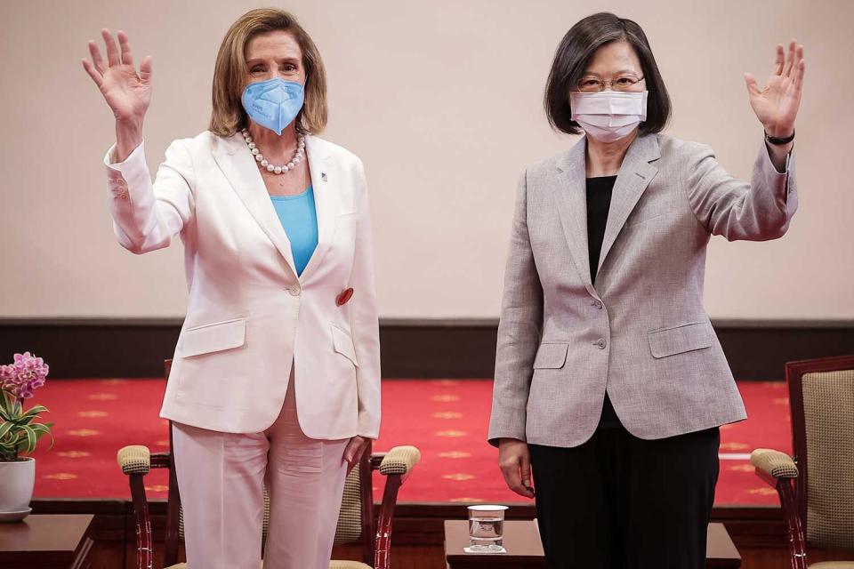 Speaker of the U.S. House Of Representatives Nancy Pelosi (D-CA), left, poses for photographs with Taiwan's President Tsai Ing-wen, right, at the president's office on August 03, 2022 in Taipei, Taiwan. Pelosi arrived in Taiwan on Tuesday as part of a tour of Asia aimed at reassuring allies in the region, as China made it clear that her visit to Taiwan would be seen in a negative light.