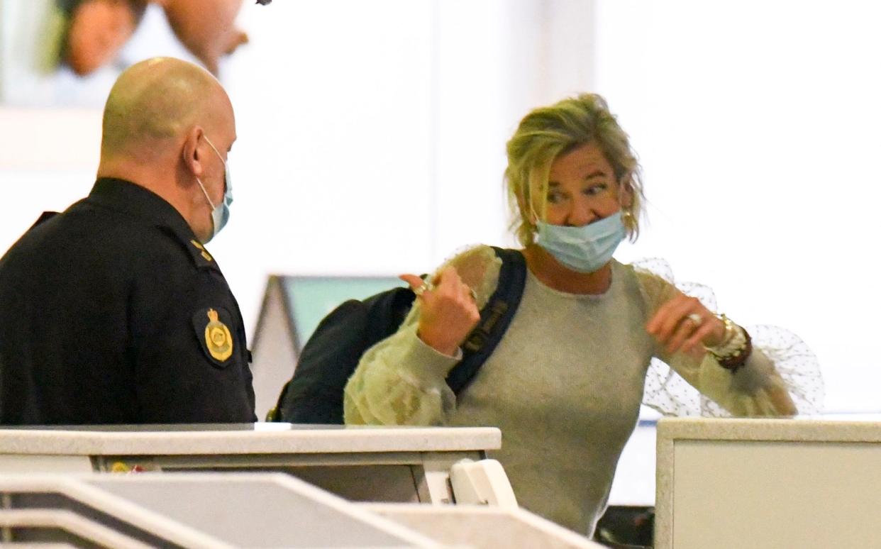 Katie Hopkins at the airport in Australia, where she is being deported - Splash News 