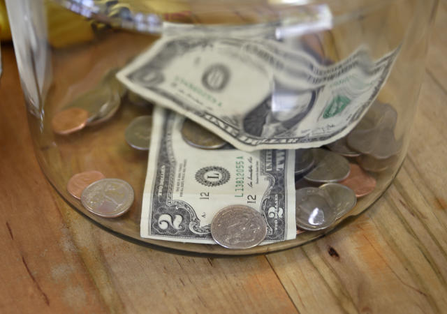 TAOS, NEW MEXICO - MAY 15, 2019: Money in a tip jar in a Taos, New Mexico, coffee shop includes a two dollar bill. (Photo by Robert Alexander/Getty Images)