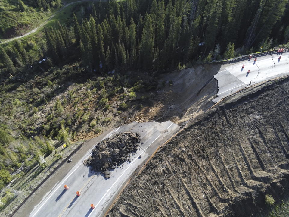 This photo provided by Wyoming Highway Patrol shows a damaged section of Teton Pass near Jackson, Wyo., on Saturday, June 8, 2024, that officials said had “catastrophically failed.” (Wyoming Highway Patrol via AP)