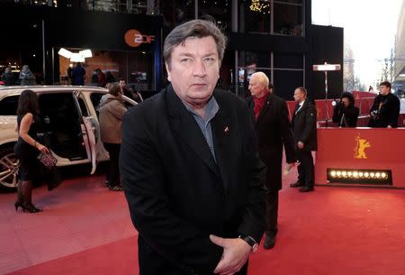 Director Aki Kaurismaki arrives for the screening of the movie 'The Other Side of Hope' at the 67th Berlinale International Film Festival in Berlin, February 14, 2017. REUTERS/Axel Schmidt