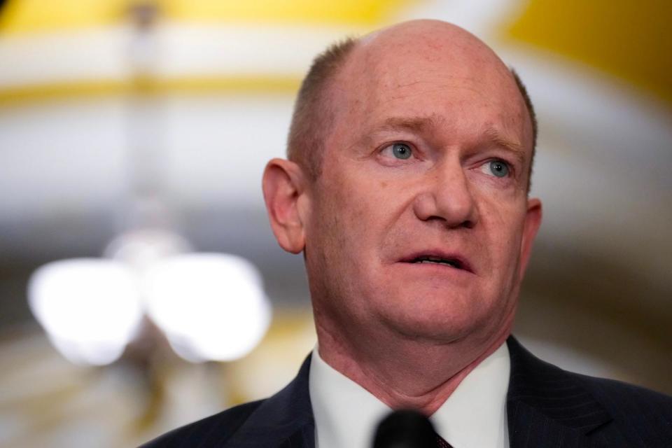 PHOTO: Sen. Chris Coons speaks during a news conference following a closed-door lunch meeting with Senate Democrats at the Capitol, Nov. 28, 2023. (Drew Angerer/Getty Images)