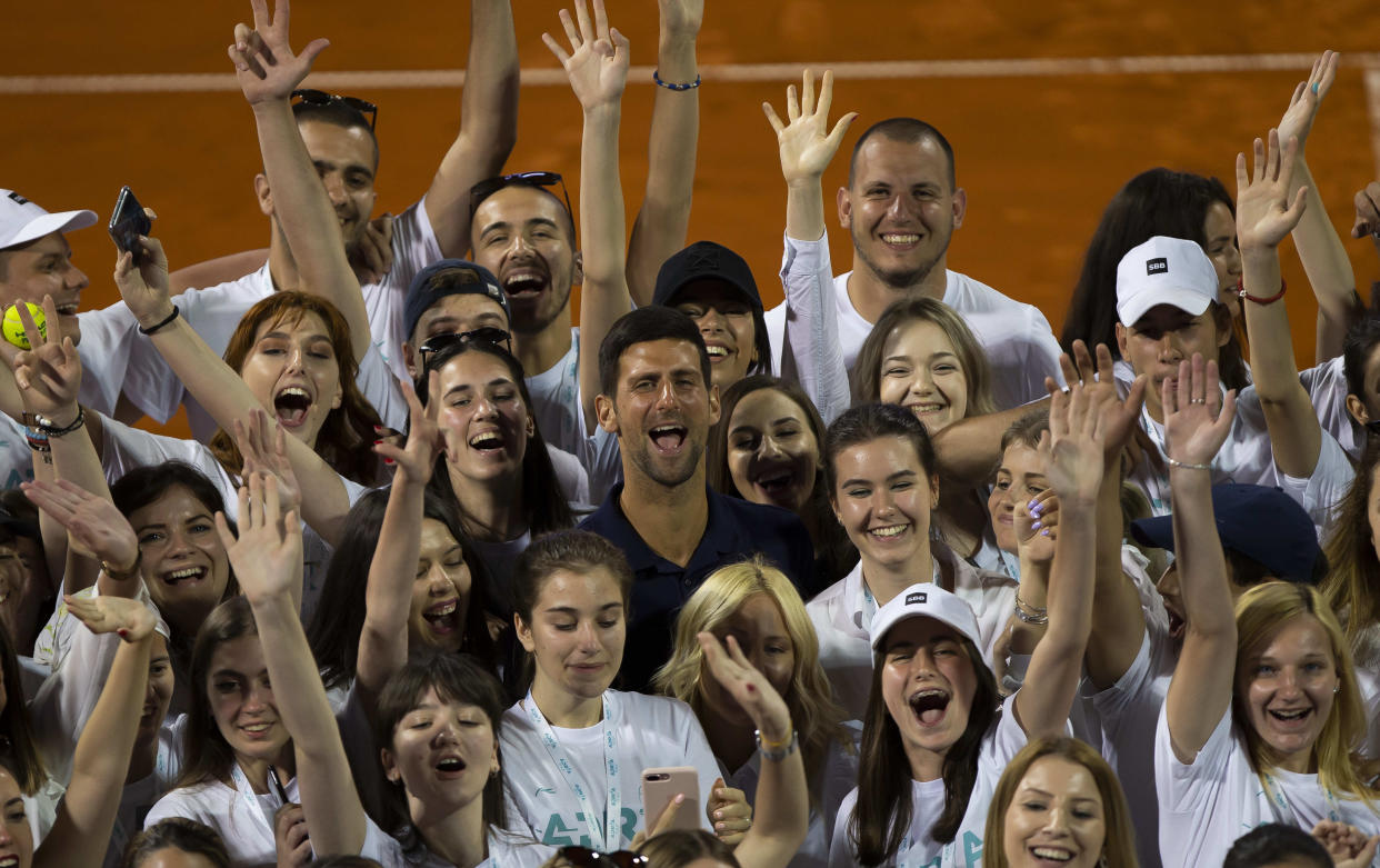 BELGRADE, SERBIA - JUNE 14: Novak Djokovic of Serbia posing for photographers with tournament volunteers on June 14, during the 3rd day of Summer Adria Tour, 2020 in Belgrade, Serbia. (Photo by Nikola Krstic/MB Media/Getty Images)