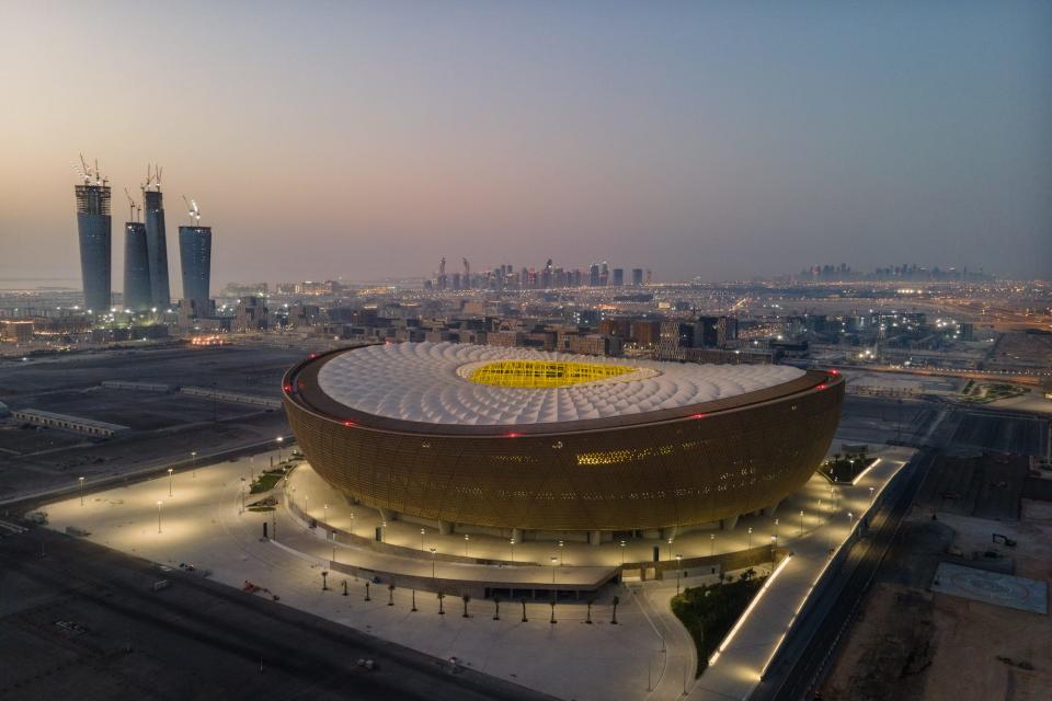 An aerial view of Lusail Stadium at sunrise on June 20, 2022 in Doha, Qatar. The 80,000-seat stadium, designed by Foster + Partners studio, will host the final game of the FIFA World Cup Qatar 2022.