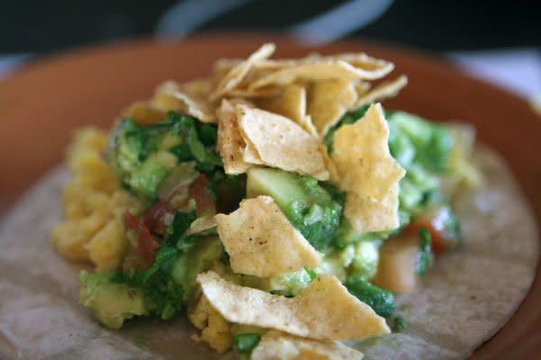 <strong>Get the <a href="http://food52.com/recipes/8117-taco-style-scrambled-eggs-with-guacamole-and-corn-chips" target="_blank">Taco-Style Scrambled Eggs with Guacamole and Corn Chips recipe from Food52</a></strong>