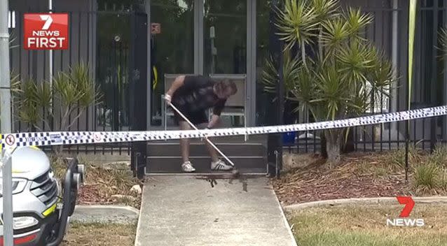 Staff clean up outside the cafe. Picture: 7 News