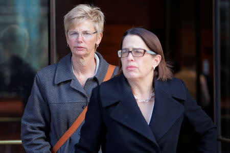 Donna Heinel (L), former associate athletic director at the University of Southern California (USC) facing charges in a nationwide college admissions cheating scheme, leaves the federal courthouse in Boston, Massachusetts, U.S., March 25, 2019. REUTERS/Brian Snyder