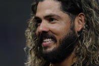 San Diego Padres' Jorge Alfaro speaks to reporters after the Padres defeated the Los Angeles Dodgers 4-3 in 10 innings in a baseball game Tuesday, Sept. 27, 2022, in San Diego. (AP Photo/Gregory Bull)