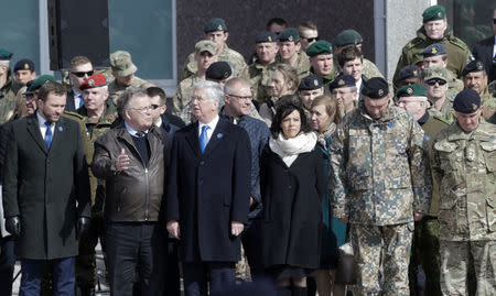 (L-R) Estonia’s Defence Minister Margus Tsahkna his Denmark’s counterpart Claus Hjort Frederiksenand Britain's Defence Secretary Michael Fallon attend the official ceremony welcoming the deployment of a multi-national NATO battalion in Tapa, Estonia, April 20, 2017. REUTERS/Ints Kalnins