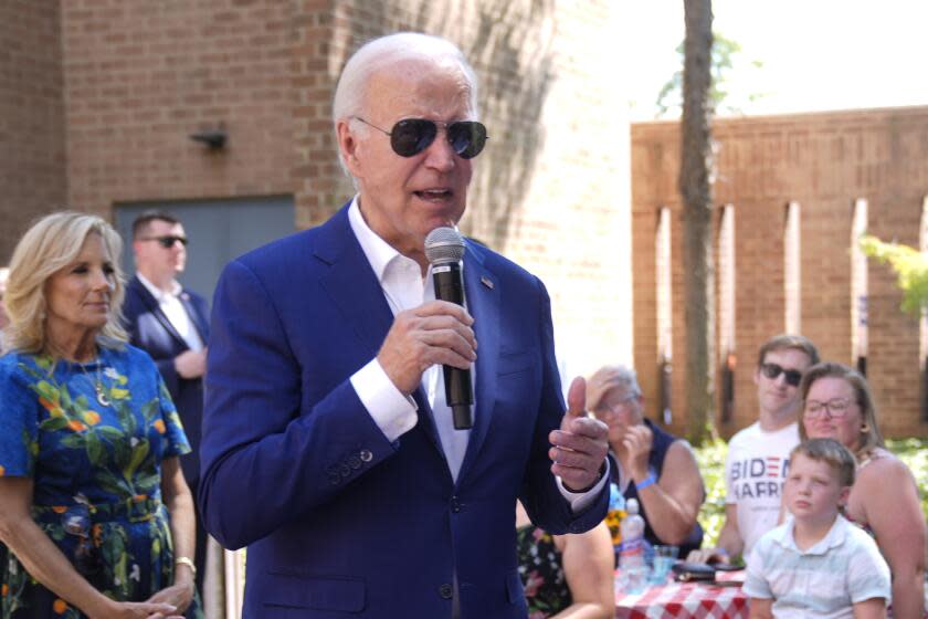 President Joe Biden speaks to supporters as first lady Jill Biden, left, looks on at a campaign rally in Harrisburg, Pa., on Sunday, July 7, 2024. (AP Photo/Manuel Balce Ceneta)