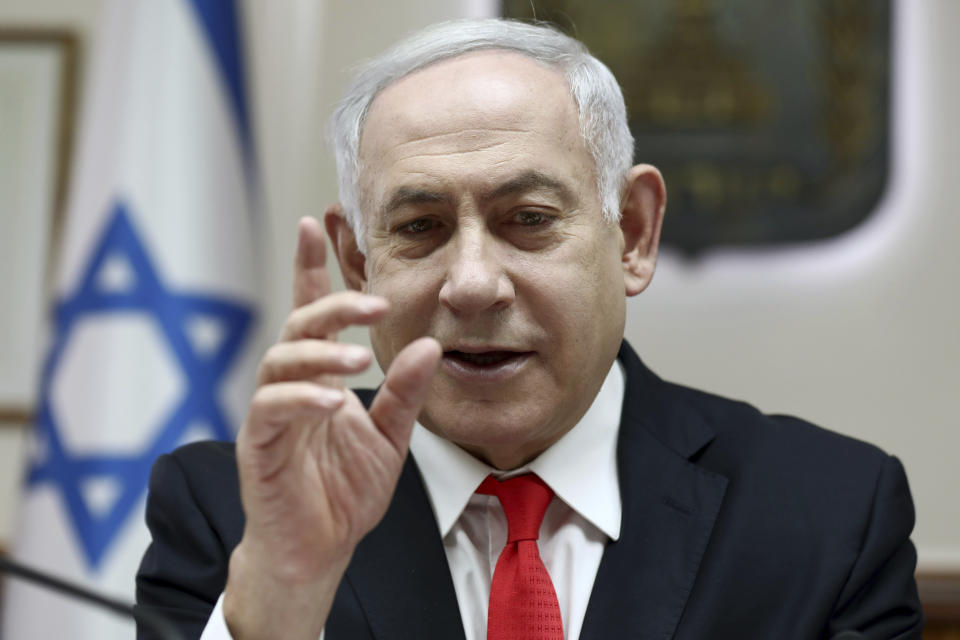 Israeli Prime Minister Benjamin Netanyahu reacts during the weekly cabinet meeting, at his office in Jerusalem, Sunday, Dec. 15, 2019. (Gali Tibbon/Pool via AP)