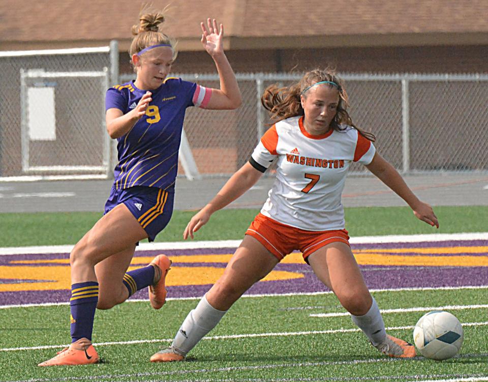 Watertown's Makenna Blank pressures Sioux Falls Washington's Isabella Messenbrink during their high school girls soccer match on Saturday, Sept. 23 at Allen Mitchell Field in Watertown.